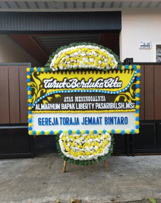 Papan Bunga Duka di Kampung